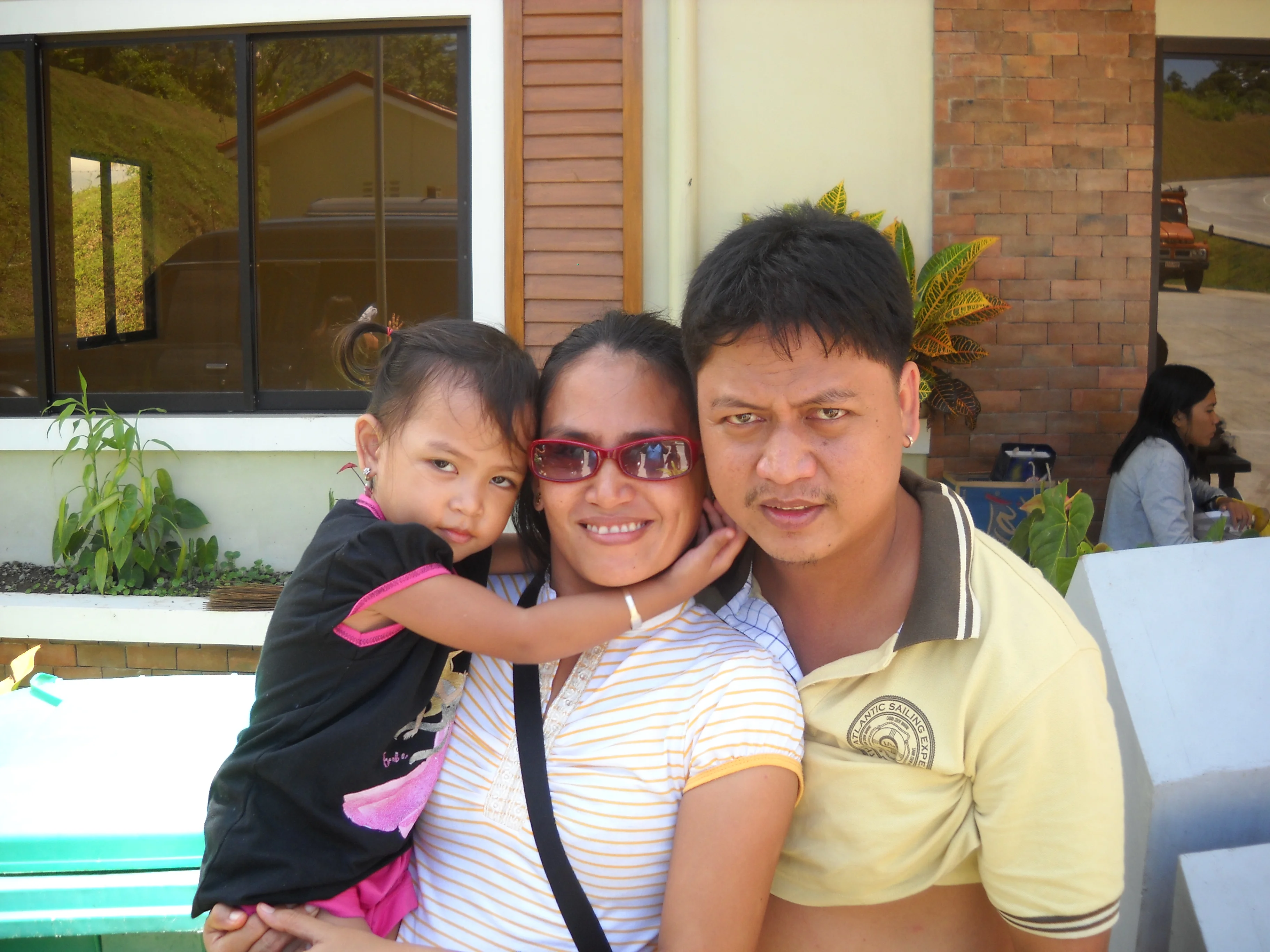 Faye with her mom & dad (Robbie & Ramil)
