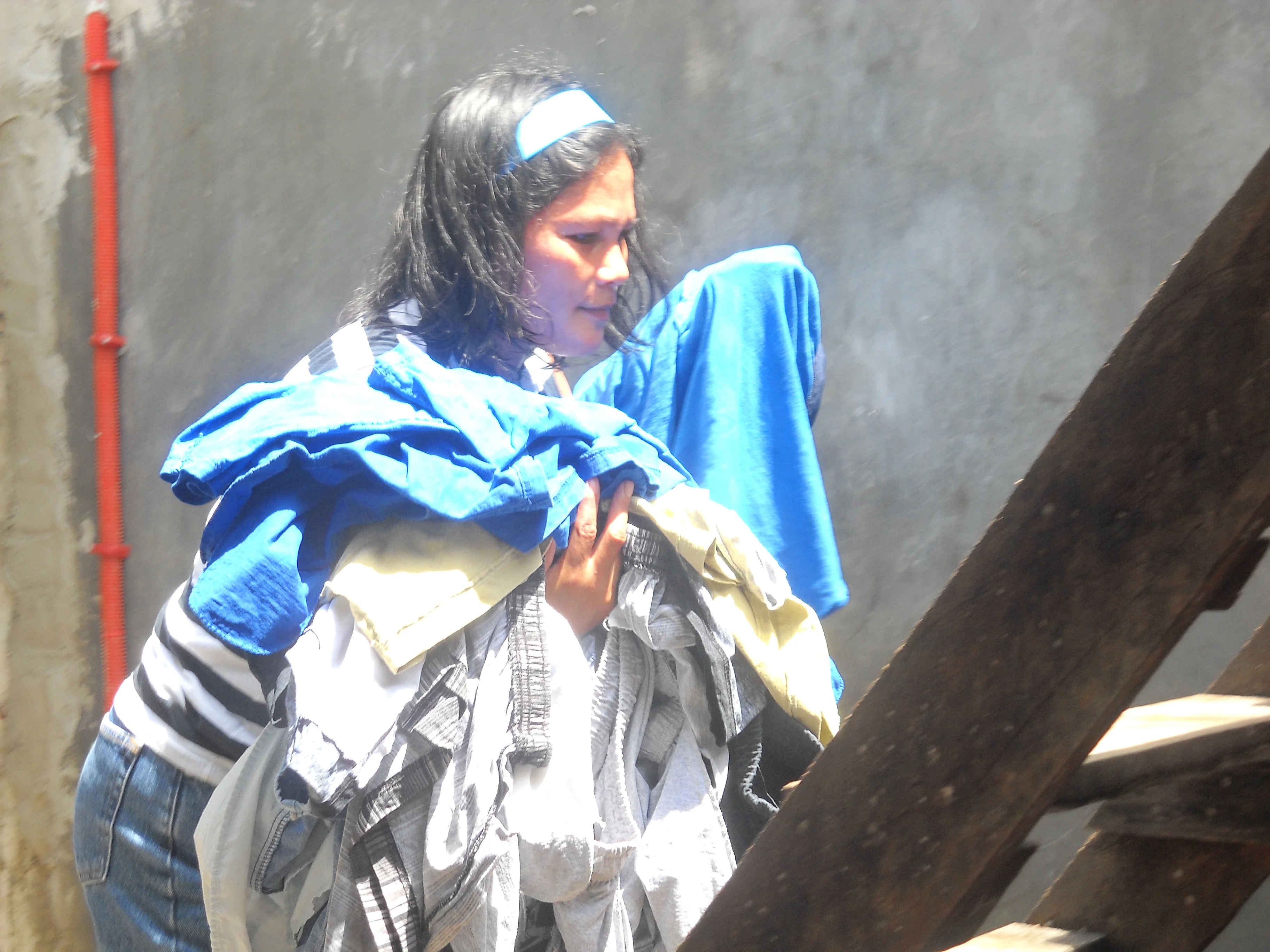 Vicky Bringing Clothes to Second Floor to Hang Them Out