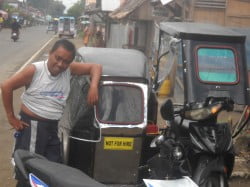 Titing and his new Tricycle